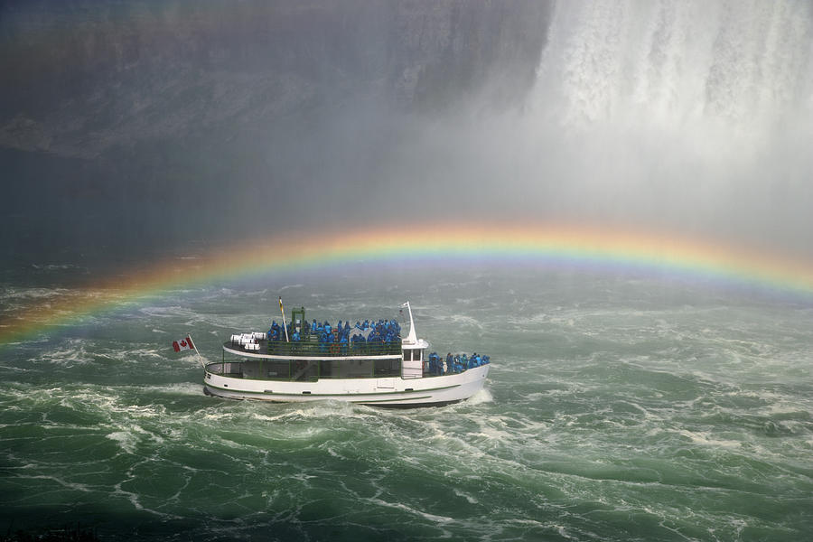 Niagara Falls and tourist boat Photograph by Guy Vanderelst