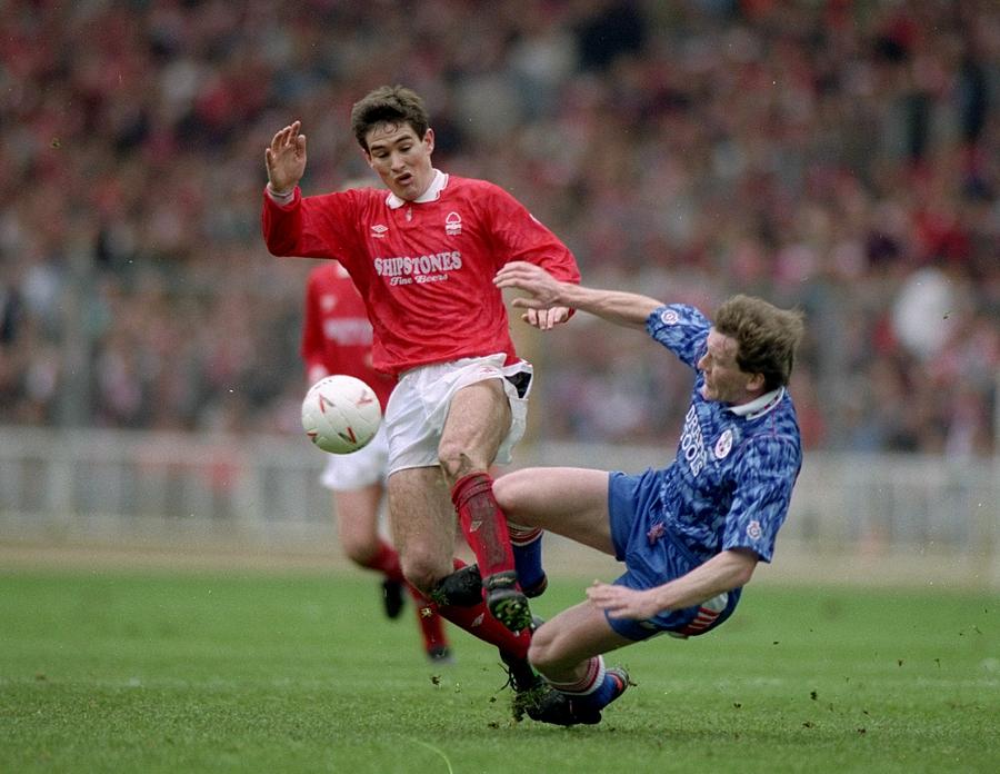 Nigel Clough of Nottingham Forest and Kevin Moore of Southampton Photograph by Shaun Botterill