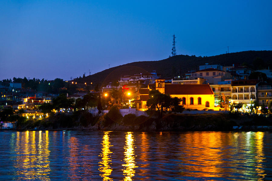 Night city scape in Neos Marmaras Photograph by Gabomadar