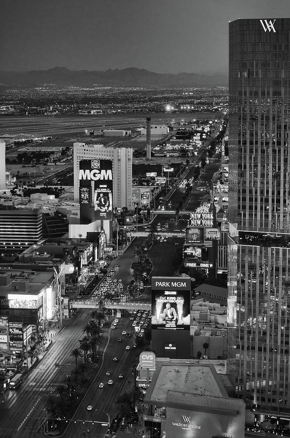Night Falling on The Strip South Las Vegas Boulevard Black and White Photograph by Shawn OBrien