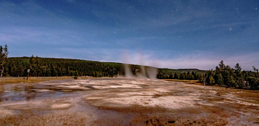 Night Photo Os Old Faithful Geisers In Yellowstone National Park Photograph by Alex Grichenko