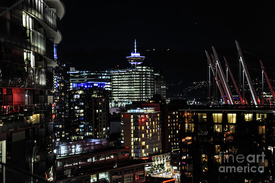 Night-time view of downtown Vancouver with colorful lights Photograph by Gunther Allen
