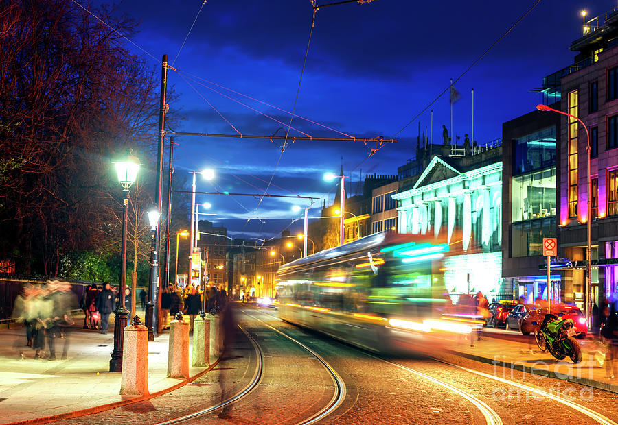 Night Tram in Dublin Ireland Photograph by John Rizzuto