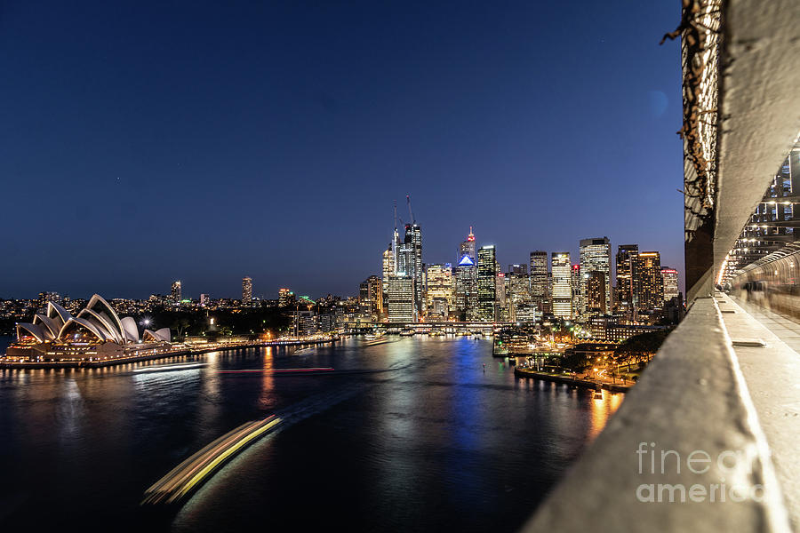 Night view of the famous Sydney bay, the Opera house from the Sy Photograph by Didier Marti