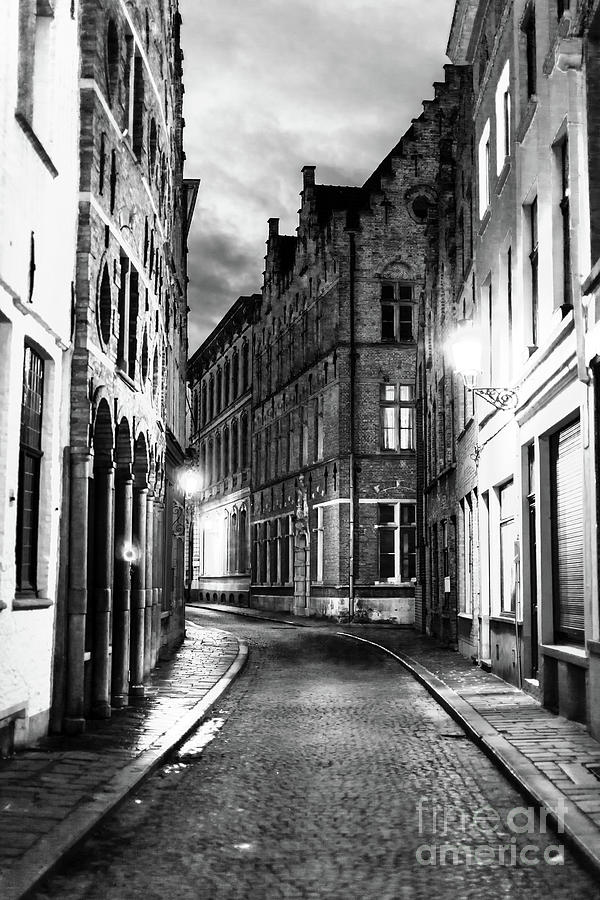 Architecture Photograph - Night Walk in Bruges by John Rizzuto