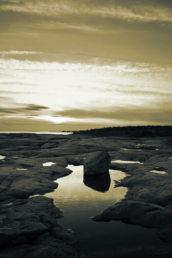 Nightfall at the rocky shore of the Baltic Sea - duotone Photograph by Ulrich Kunst And Bettina Scheidulin