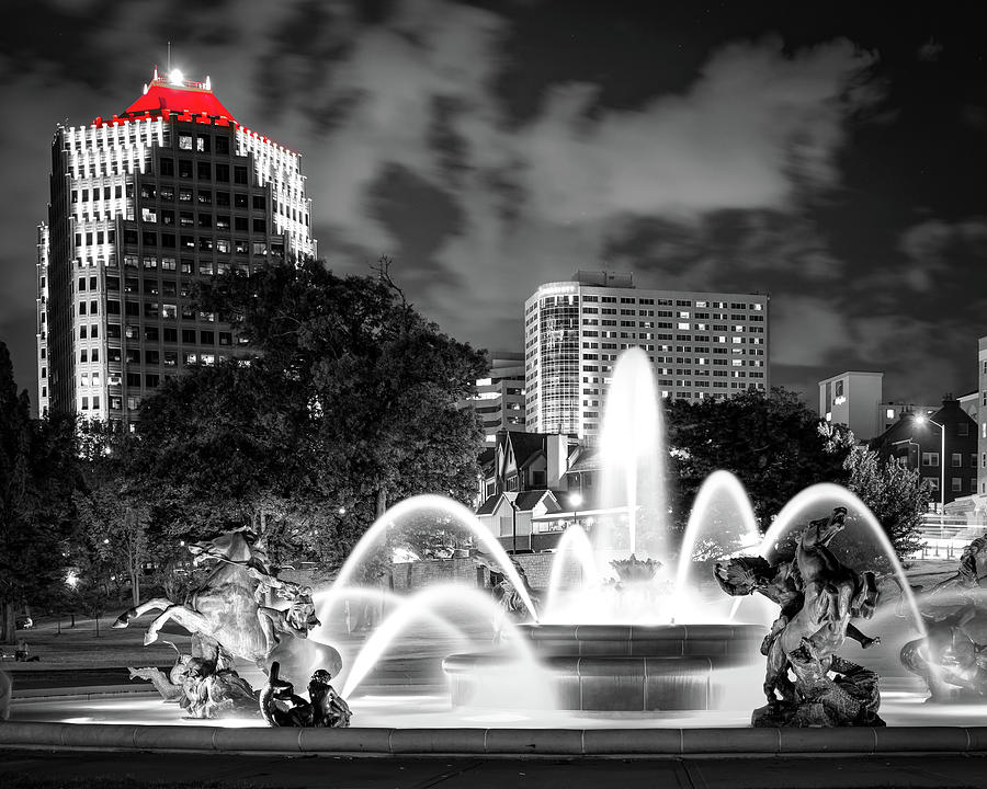 Nightfall Symphony - The Illuminated Memorial Fountain In Monochrome With A Red Crescendo Photograph by Gregory Ballos