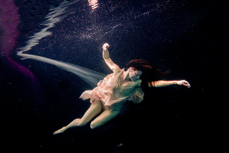 Nina just floating under the surface Photograph by Dan Friend - Fine ...