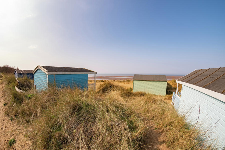 Norfolk beach huts Photograph by Chris Yaxley