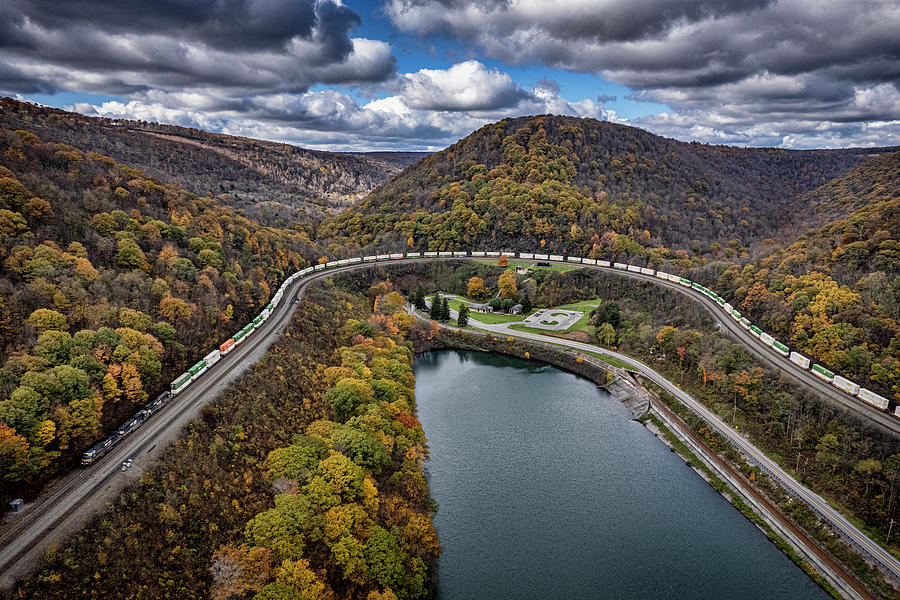 Norfolk Southern 4041 leads a westbound through Horseshoe Curve Photograph by Jim Pearson