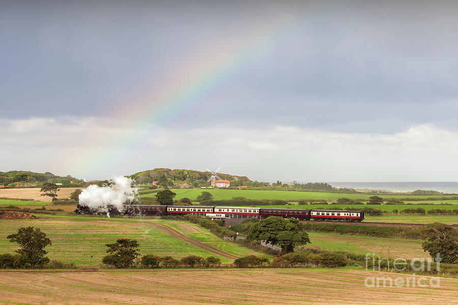 Norfolk steam train with Weybourne windmill and rainbow Photograph by Simon Bratt Norfolk steam train with Weybourne windmill and rainbow Photograph by Simon Bratt