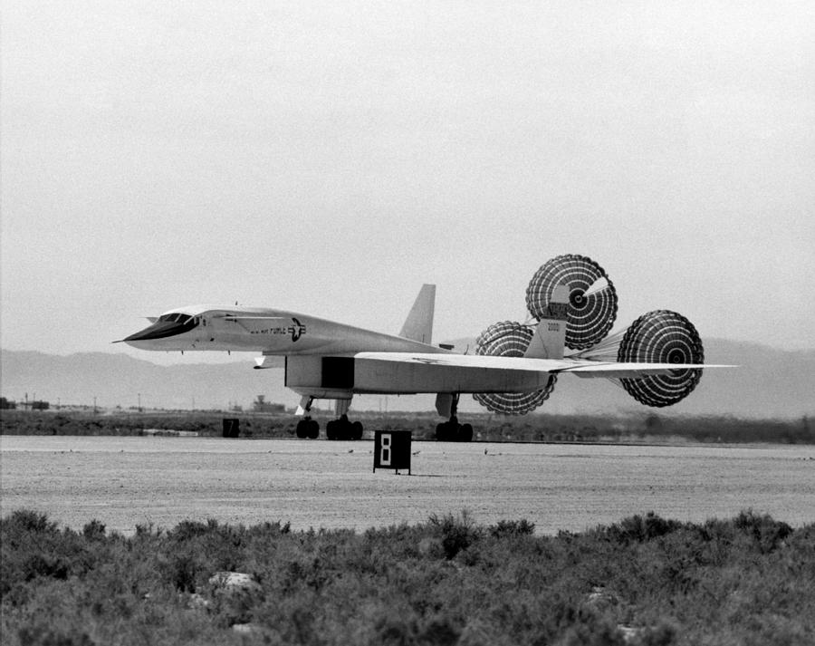 North American XB-70 Deploying Drogue Parachutes Upon Landing - Circa 1965 Photograph by War Is Hell Store