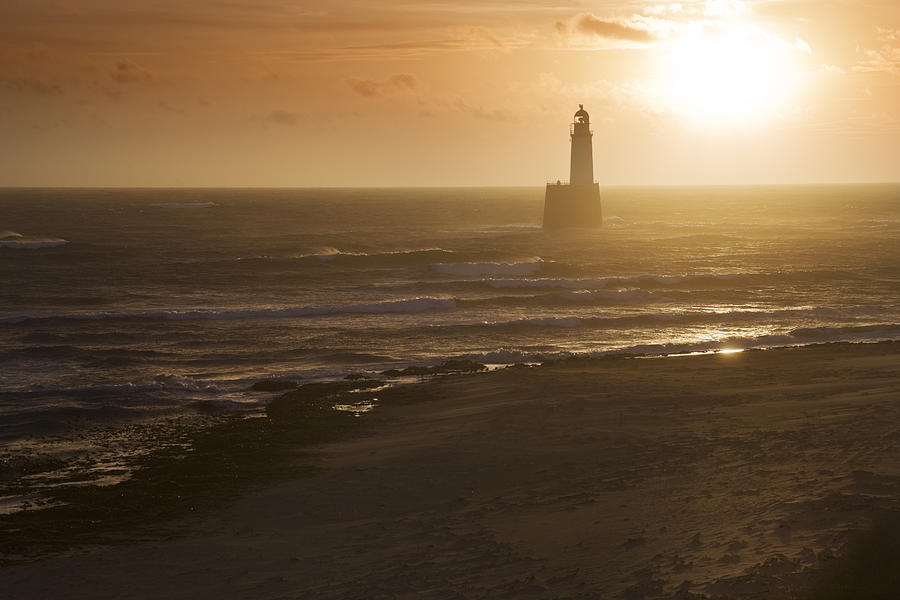 North Sea Lighthouse And Beach At Dawn Photograph by Theasis