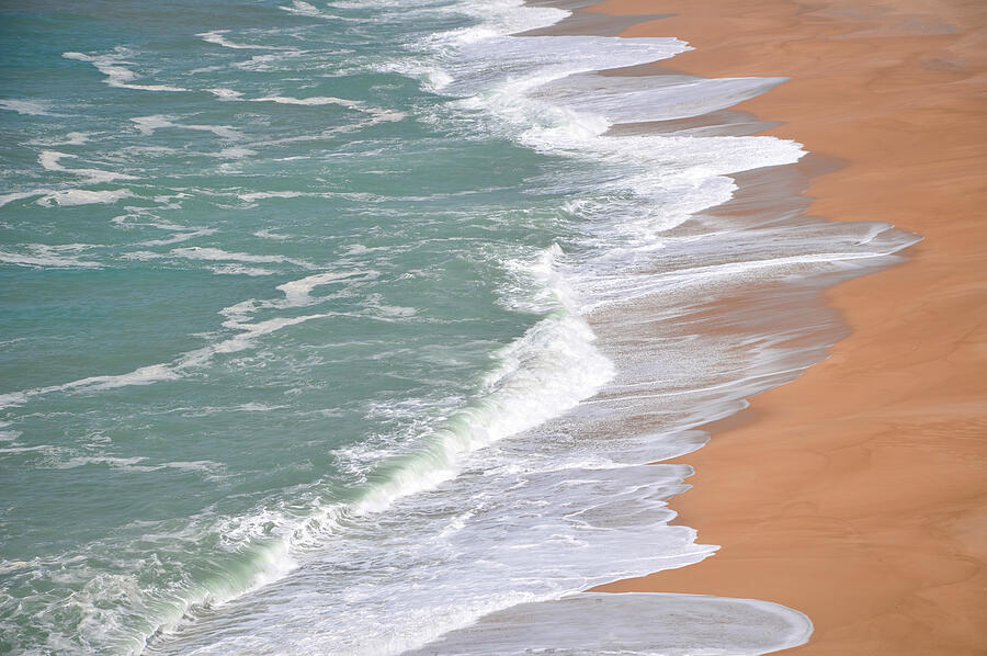 North Shore Nazare Beach Portugal Photograph by Rebecca Herranen