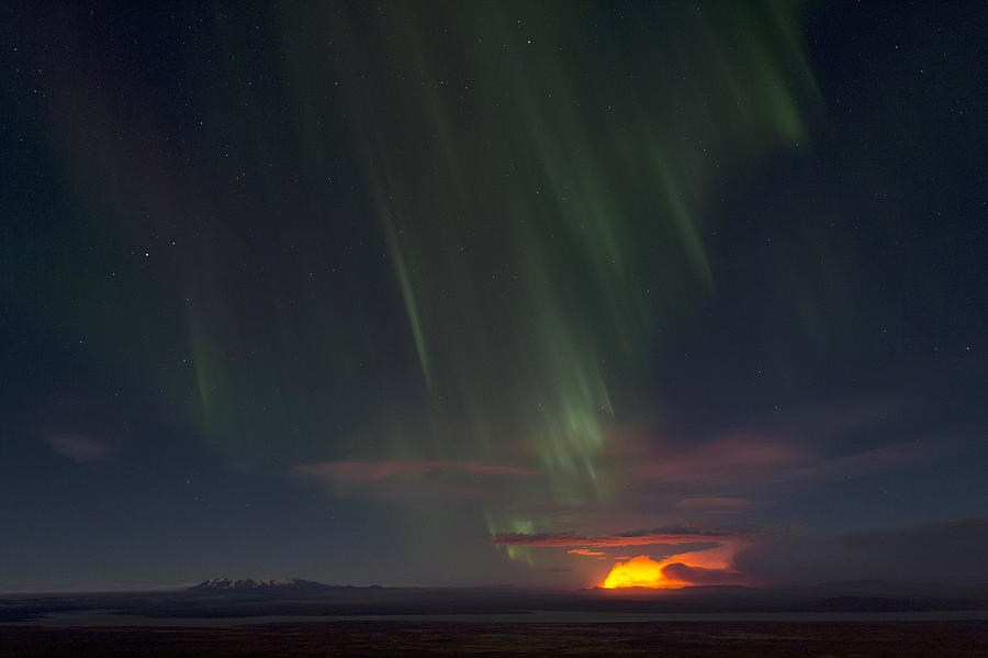 Northern lights and night-time glow of the Holuhraun fissure eruption north of the volcano Baroarbunga, Suour-Pingeyjarsysla, Highlands of Iceland, Northeast Iceland, Iceland Photograph by Olaf Kruger