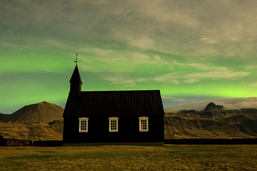Northern Lights and the Black Church in Iceland Photograph by Catherine Reading
