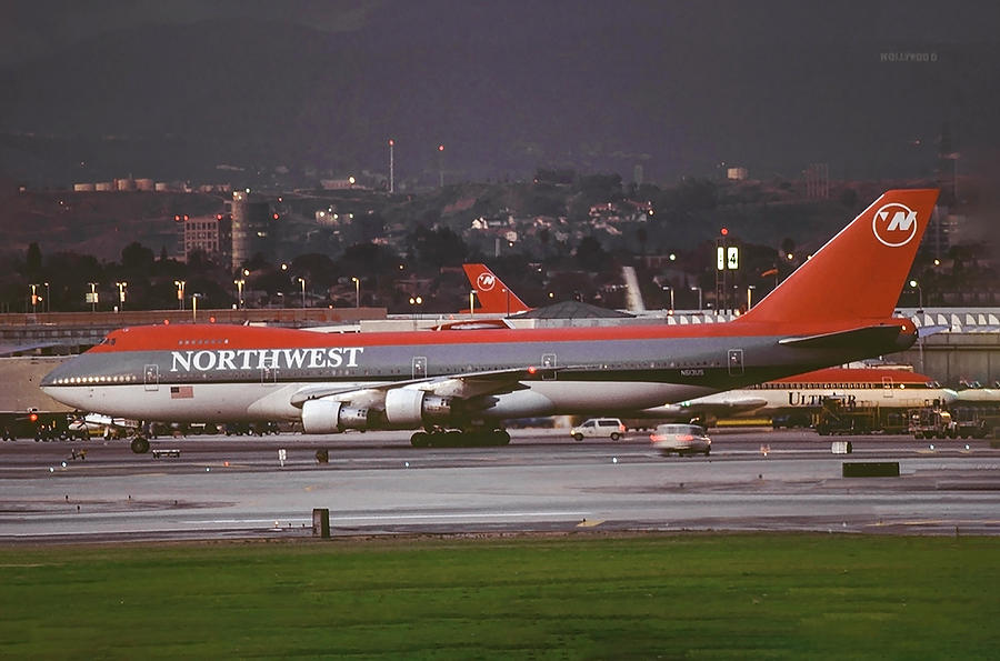 Northwest Boeing 747 During Twilight Photograph by Erik Simonsen