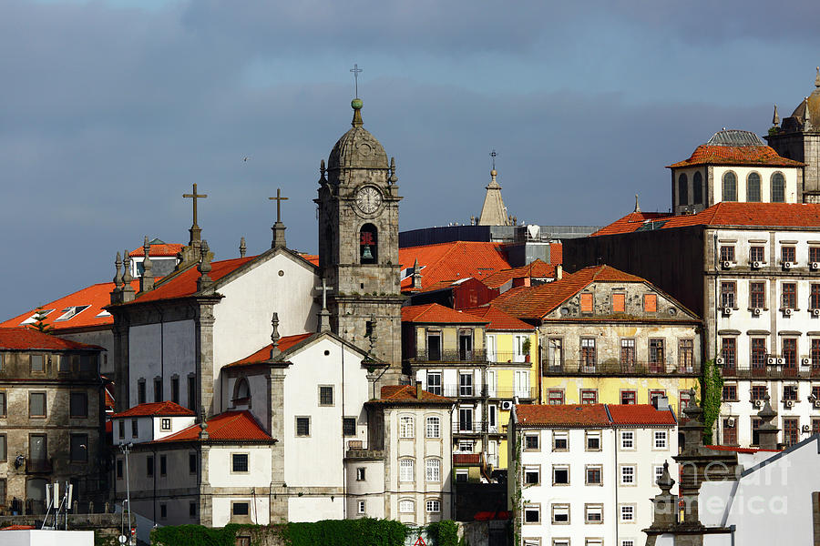 Architecture Photograph - Nossa Senhora da Vitoria church and houses Oporto Portugal by James Brunker