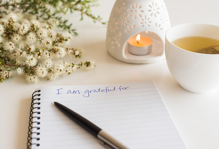 Notebook with I am grateful for in handwritten text Photograph by Natalie_board