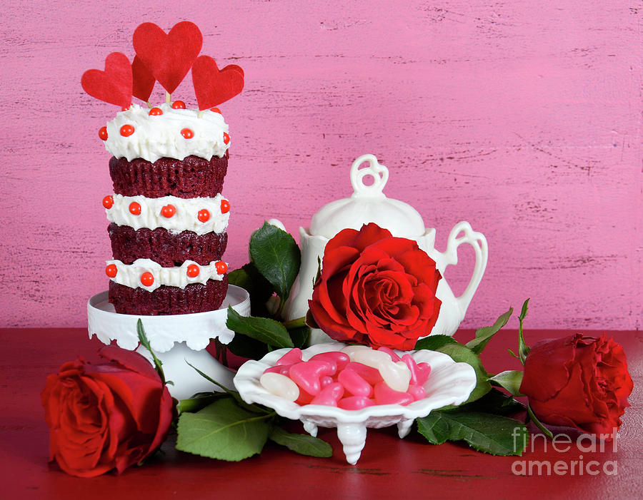 Novelty triple layer red velvet cupcake Photograph by Milleflore Images