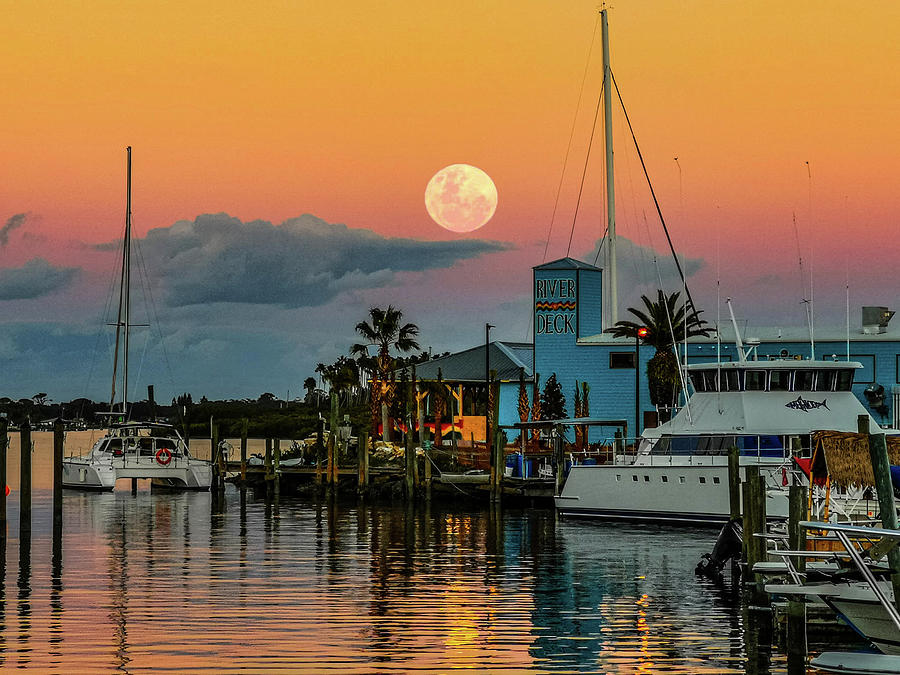 New Smyrna Beach Marina with Full Moon at Sunset Photograph by Danny Mongosa
