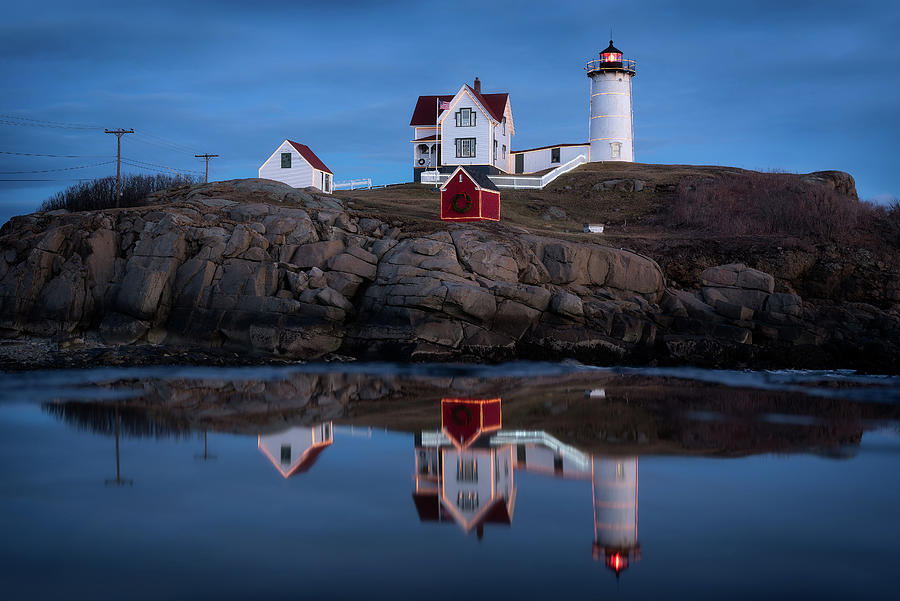 Christmas Photograph - Nubble Light - Holiday Lights During Blue Hour by Jeff Bazinet