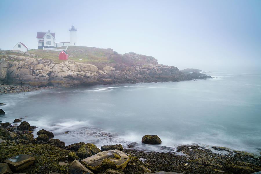 Nubble lighthouse in fog Photograph by Alexey Stiop