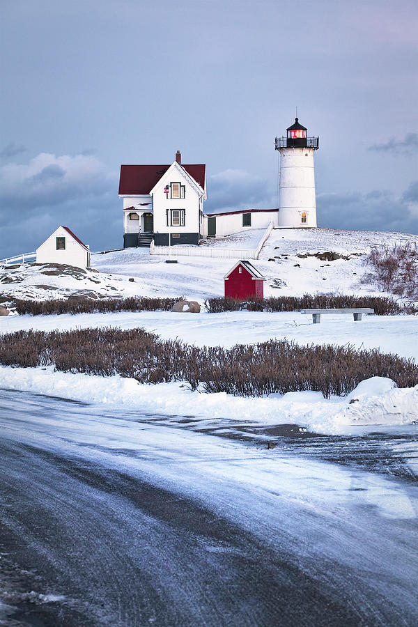 Winter Photograph - Nubble Lighthouse in the Snow by Eric Gendron