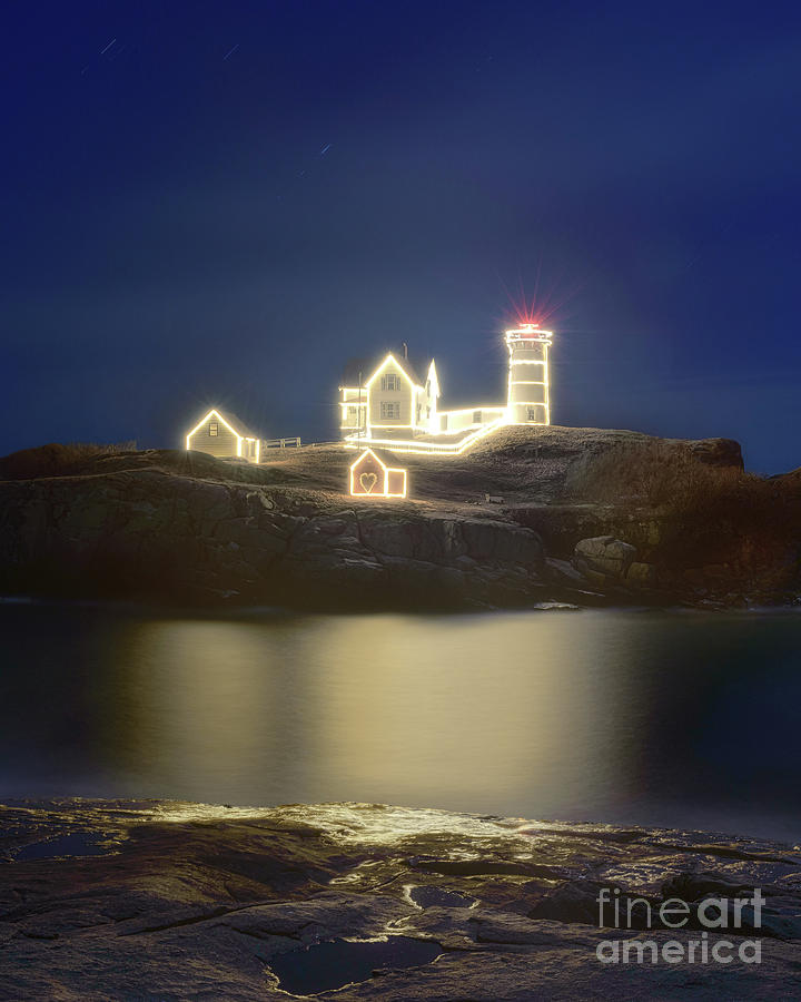 Nubble Lighthouse Lit Photograph by Sharon Seaward