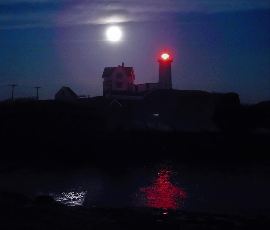 - Nubble Lighthouse under a full moon Photograph by THERESA Nye