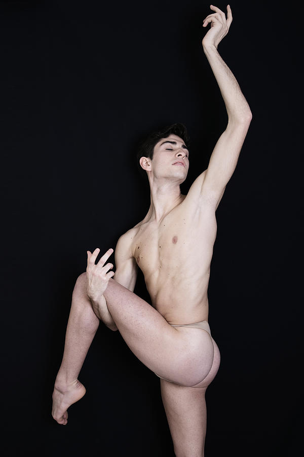 Nude male ballet dancer posing with his leg up Photograph by By Wunderfool