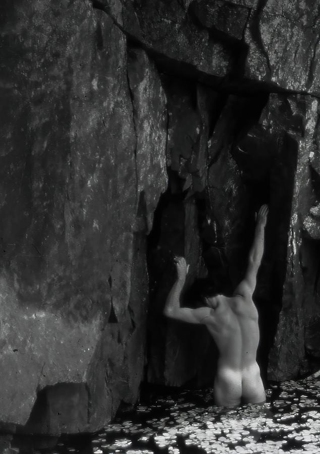 Nude Monochrome Against Rock Wall Photograph by Wayne King