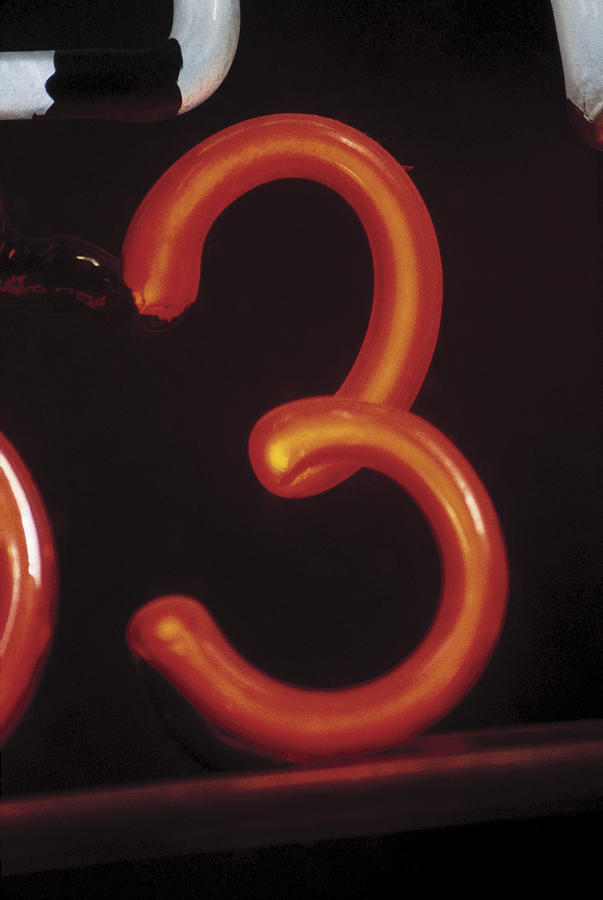 Number three on neon sign Photograph by Comstock Images