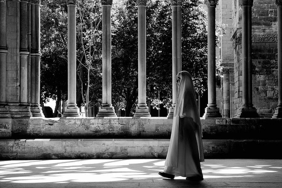 Nun Walking Through Church Cloister, Black and White Photograph by Caracterdesign