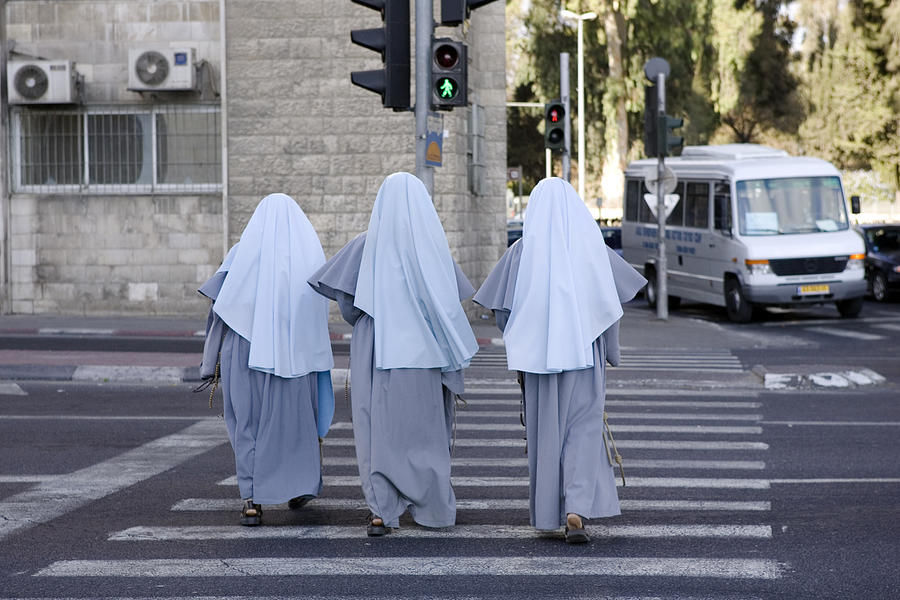 Nuns on the Run Photograph by TerryJ