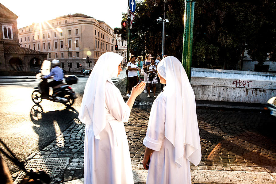 Nuns walking in Central Rome, close to Vatican City Photograph by LeoPatrizi