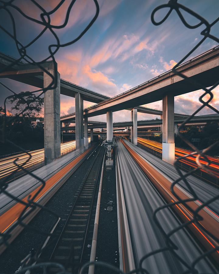 Oakland overpass sunset train light trails Photograph by Andrew Wille