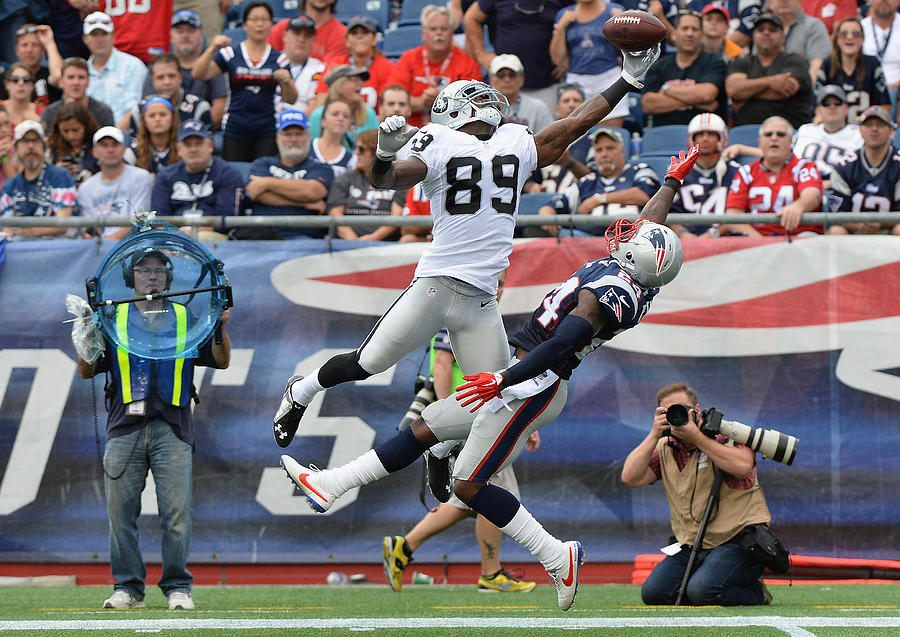 Oakland Raiders v New England Patriots Photograph by Darren McCollester