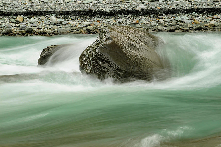 Obstacle in flowing water - rock meets mountain river Photograph by ...