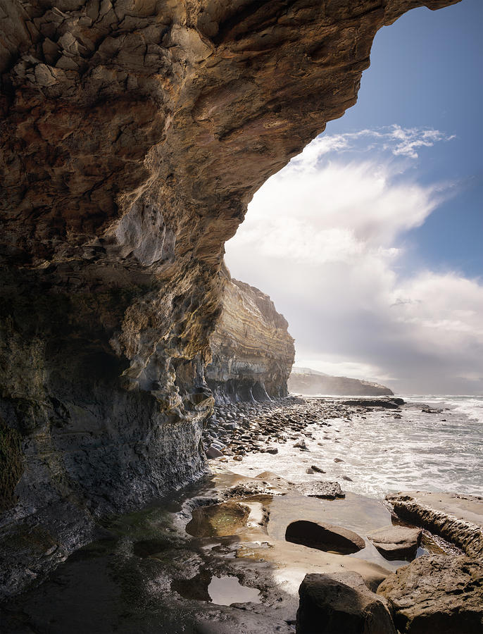 Ocean Beach Cliffs and Passing Rain Clouds Photograph by William ...