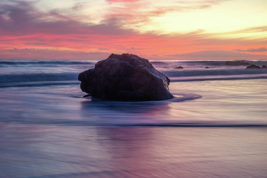 Ocean Swirling Around a Rock at Sunset Photograph by Matthew DeGrushe