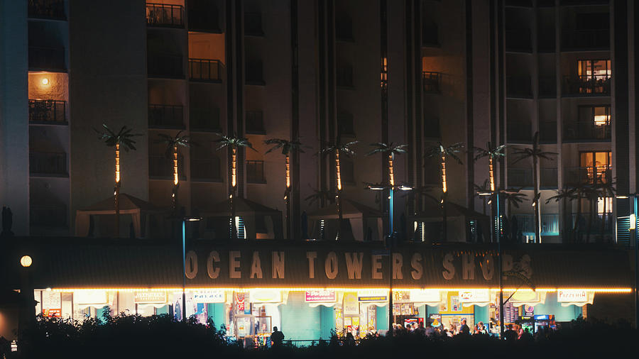Ocean Towers Shop At Night Photograph by Jason Fink