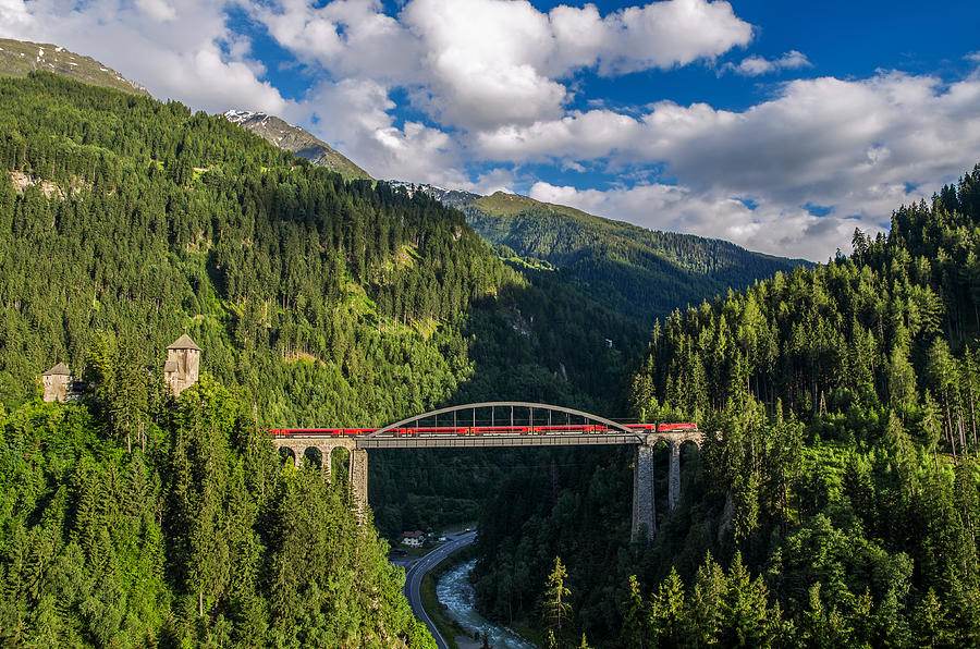 OEBB Railjet train passing a bridge in Tyrol Photograph by Traumlichtfabrik