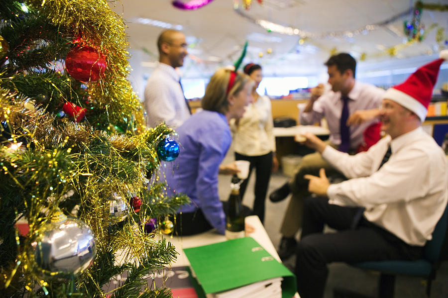 Office Christmas party Photograph by Jacobs Stock Photography