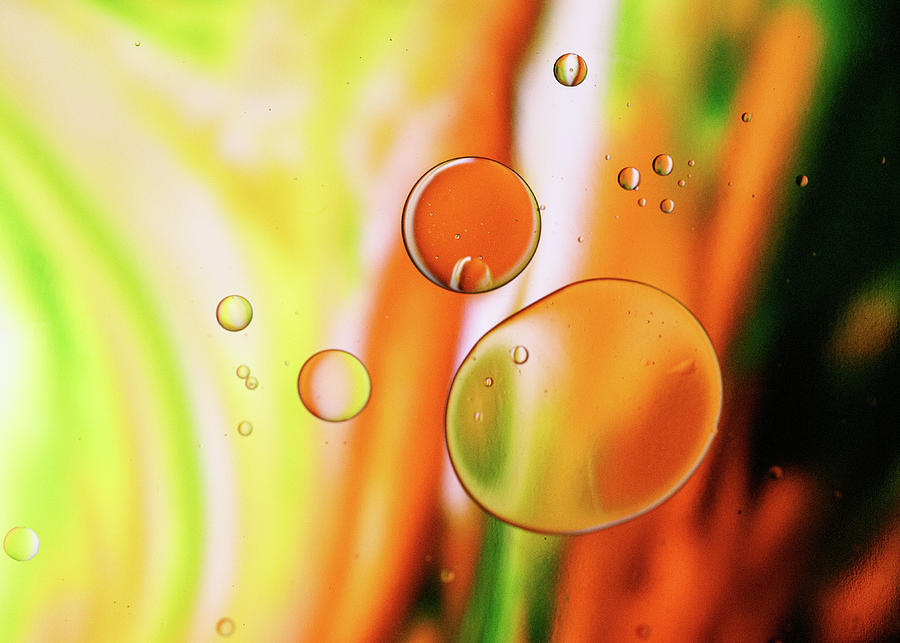 Oil and Water Abstract in Green and Orange Photograph by Amelia Pearn