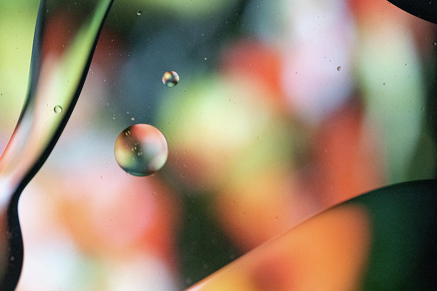 Oil and Water on a Colorful background Photograph by Amelia Pearn