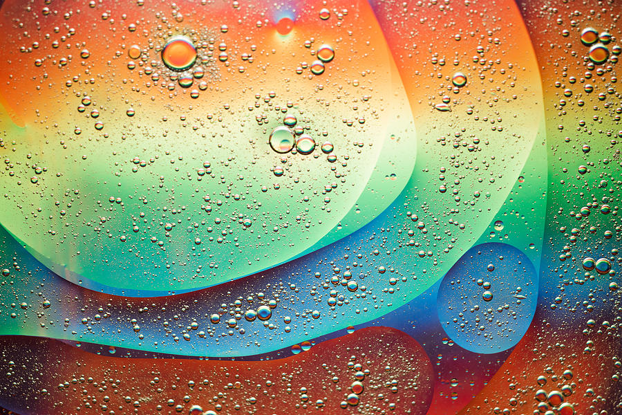 Oil Bubbles in Rainbow Color Photograph by MirageC