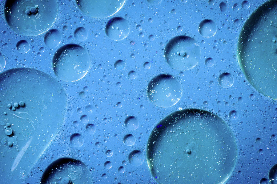 Oil on Water Droplets Photograph by John Williams