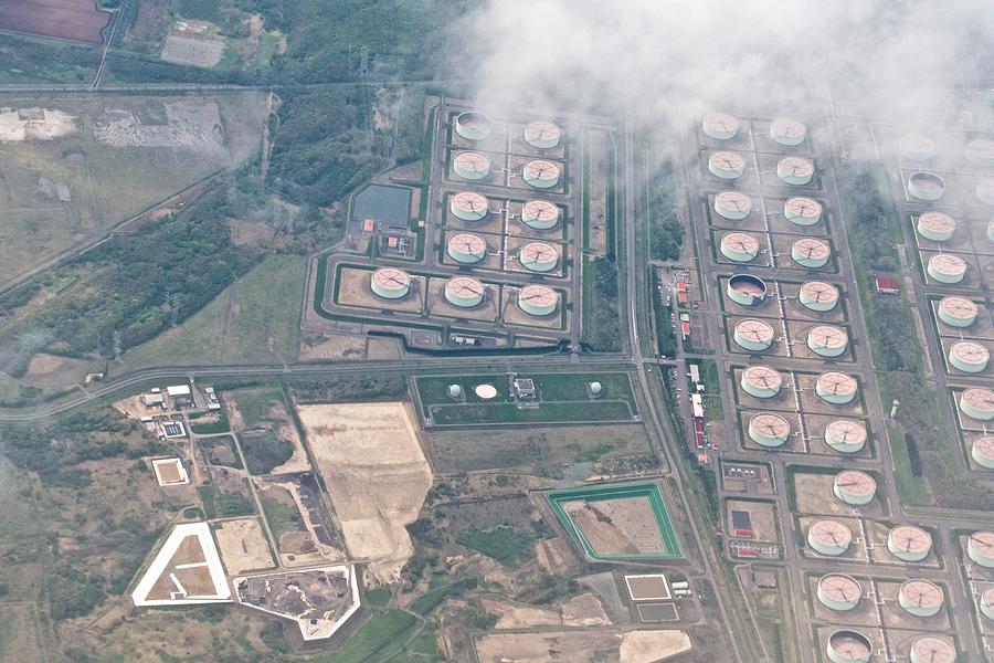 Oil stockpiling base in Tomakomai city in Hokkaido daytime aerial view from airplane Photograph by Taro Hama @ e-kamakura
