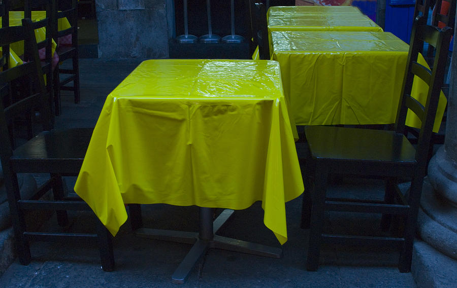 Oiled tablecloths in Spanish restaurant Photograph by Lyn Holly Coorg